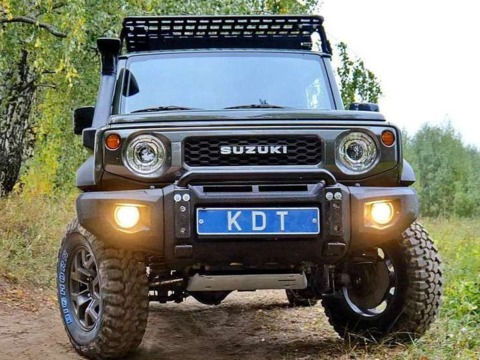 Передний композитный бампер для Suzuki Jimny (c 2019 г., под покраску)